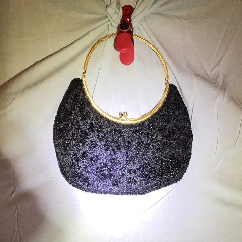 Stylecraft evening bag, beaded black on both sides, with gold tone handle & rim.